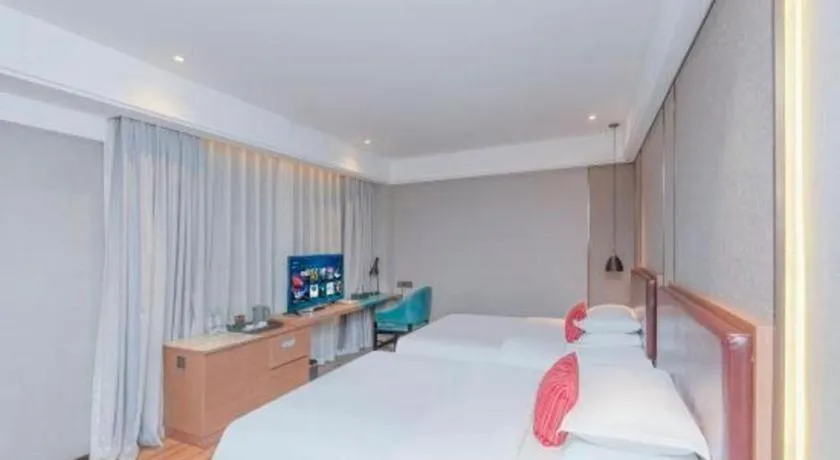 Bed in Borrman Hotel Liuzhou Guizhong Avenue Liugao