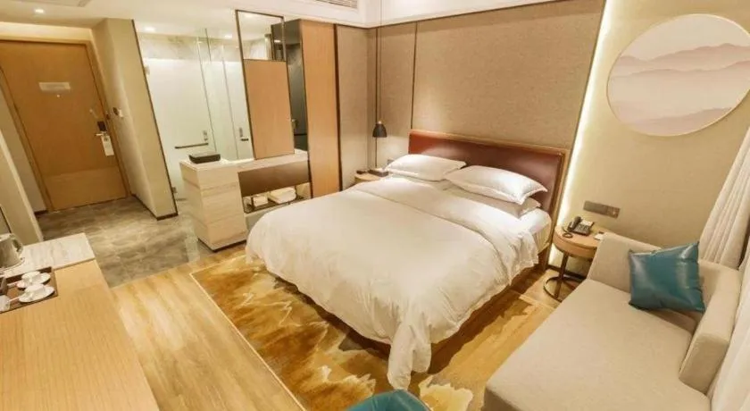 Bed in Borrman Hotel Liuzhou Guizhong Avenue Liugao