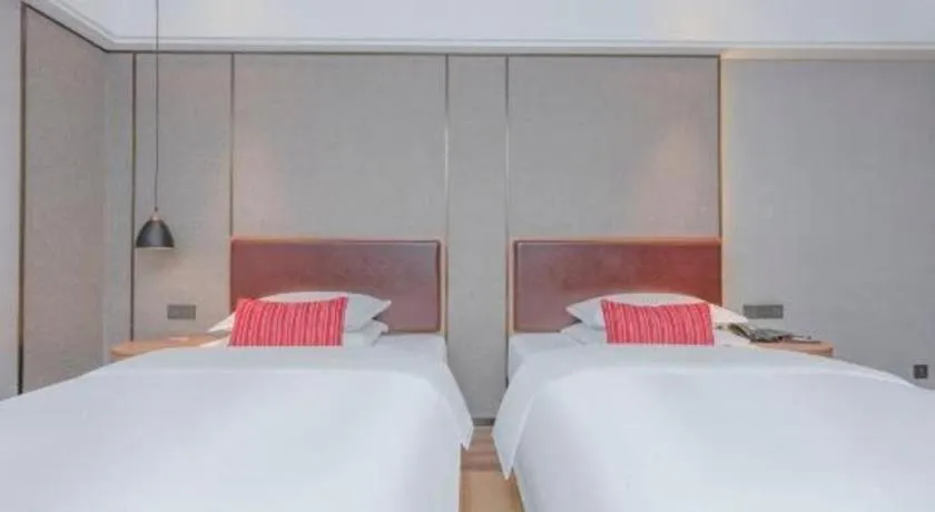 Bed in Borrman Hotel Liuzhou Guizhong Avenue Liugao