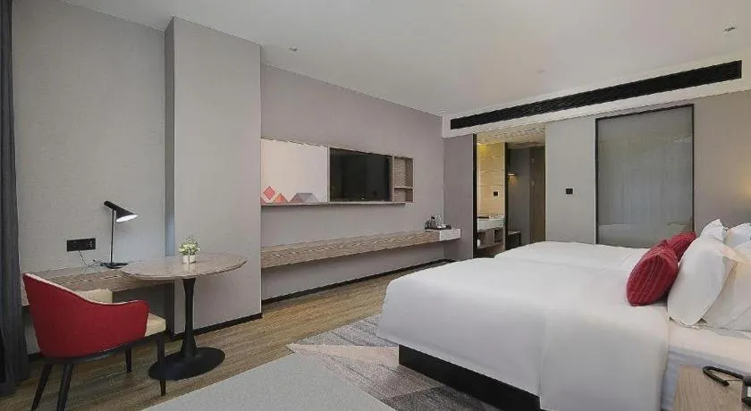 Bed in Borrman Hotel Liuzhou Guizhong Avenue Liugao