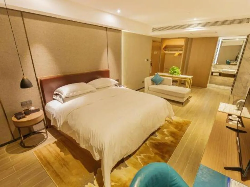 Bed in Borrman Hotel Liuzhou Guizhong Avenue Liugao