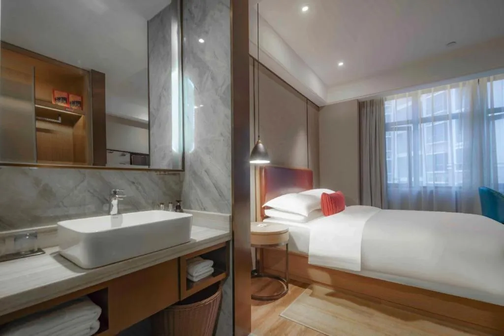 Bed in Borrman Hotel Liuzhou Guizhong Avenue Liugao