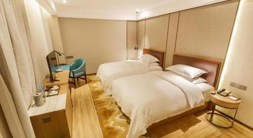 Bed in Borrman Hotel Liuzhou Guizhong Avenue Liugao