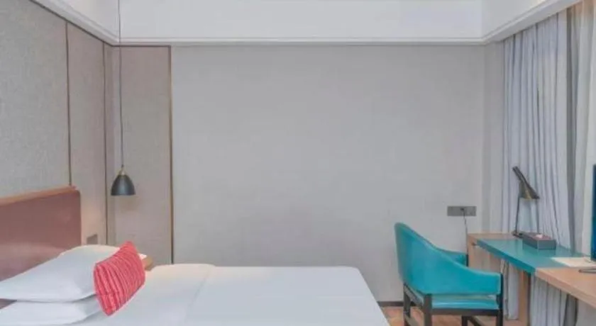 Bed in Borrman Hotel Liuzhou Guizhong Avenue Liugao