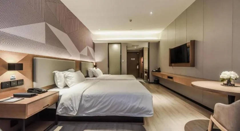 Bed in Borrman Hotel Liuzhou Guizhong Avenue Liugao