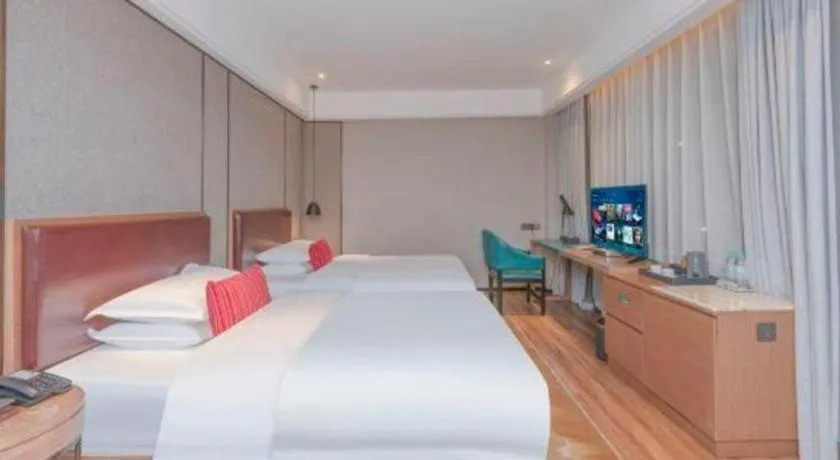 Bed in Borrman Hotel Liuzhou Guizhong Avenue Liugao