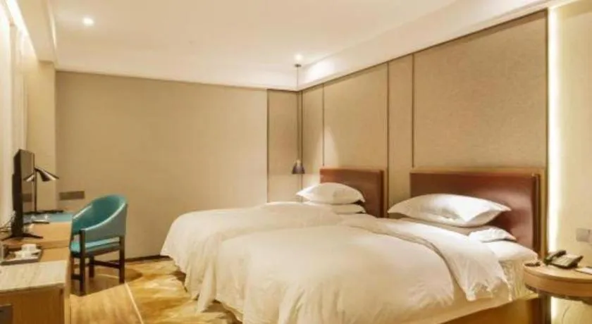 Bed in Borrman Hotel Liuzhou Guizhong Avenue Liugao