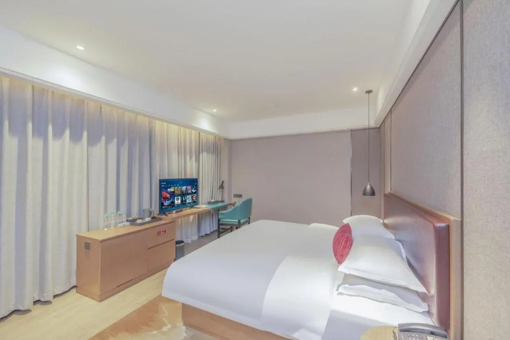 Bed in Borrman Hotel Liuzhou Guizhong Avenue Liugao