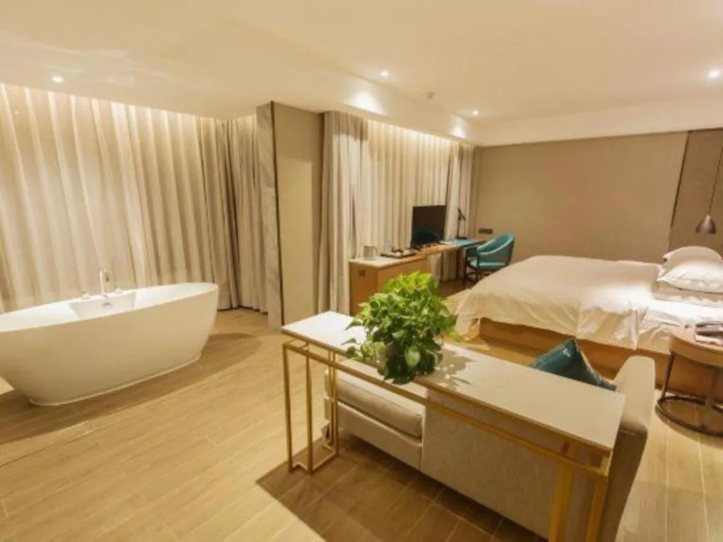 Bed in Borrman Hotel Liuzhou Guizhong Avenue Liugao