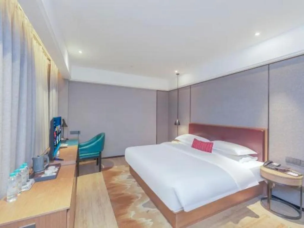 Bed in Borrman Hotel Liuzhou Guizhong Avenue Liugao