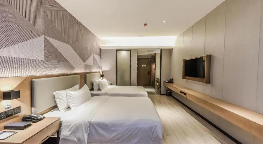 Bed in Borrman Hotel Liuzhou Guizhong Avenue Liugao