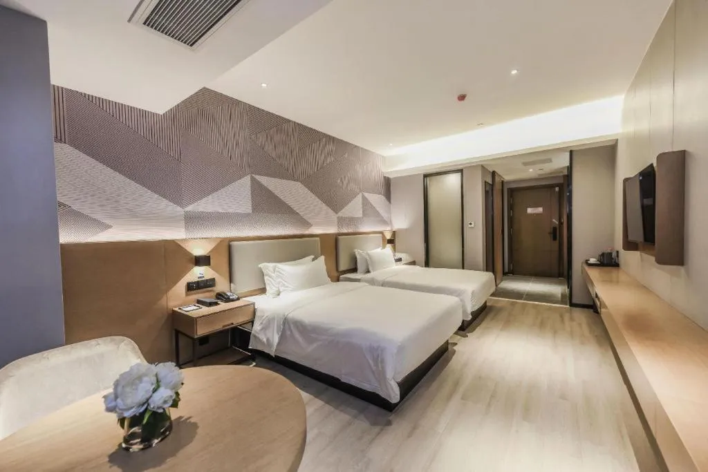 Bed in Borrman Hotel Liuzhou Guizhong Avenue Liugao