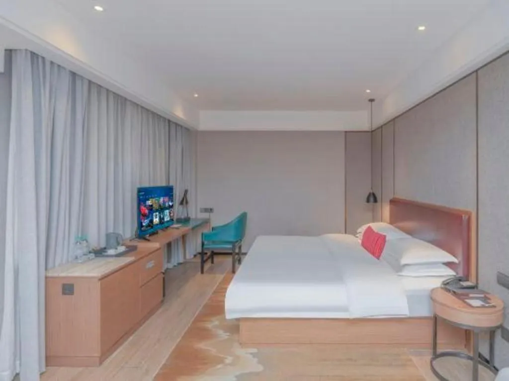 Bed in Borrman Hotel Liuzhou Guizhong Avenue Liugao