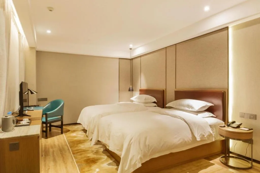 Bed in Borrman Hotel Liuzhou Guizhong Avenue Liugao