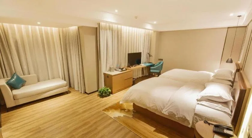 Bed in Borrman Hotel Liuzhou Guizhong Avenue Liugao