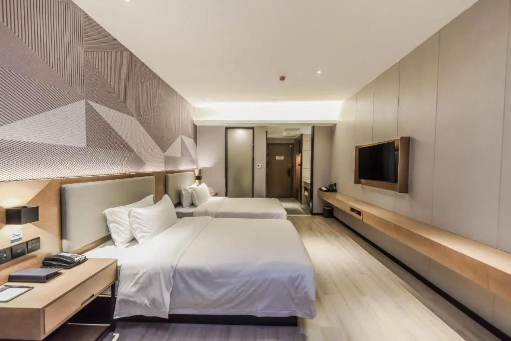 Bed in Borrman Hotel Liuzhou Guizhong Avenue Liugao