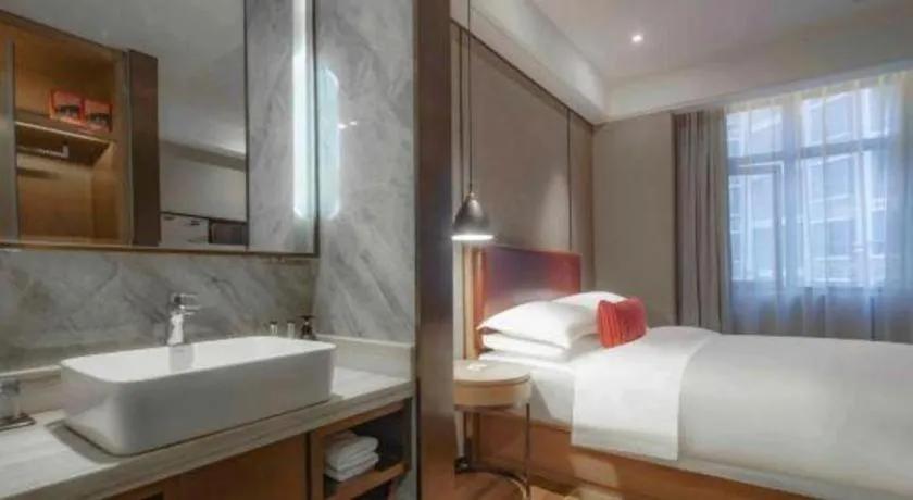 Bed in Borrman Hotel Liuzhou Guizhong Avenue Liugao