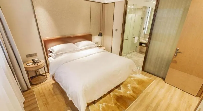 Bed in Borrman Hotel Liuzhou Guizhong Avenue Liugao