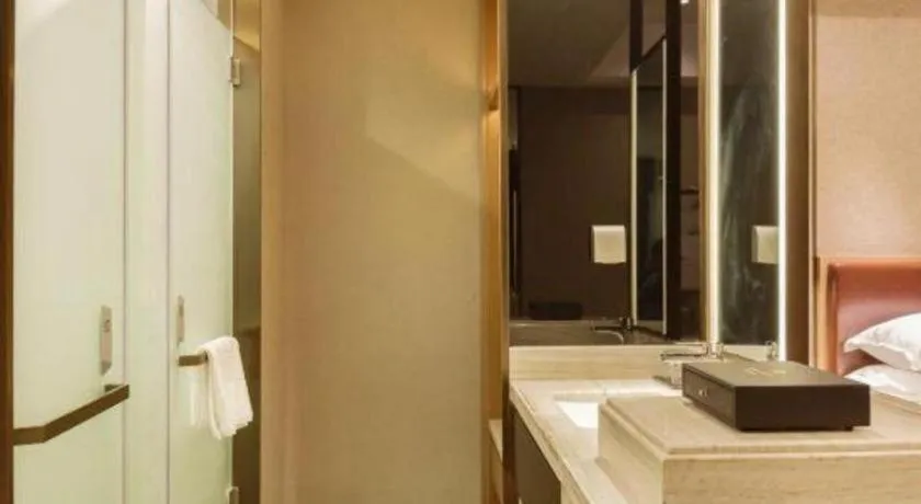 Bed in Borrman Hotel Liuzhou Guizhong Avenue Liugao