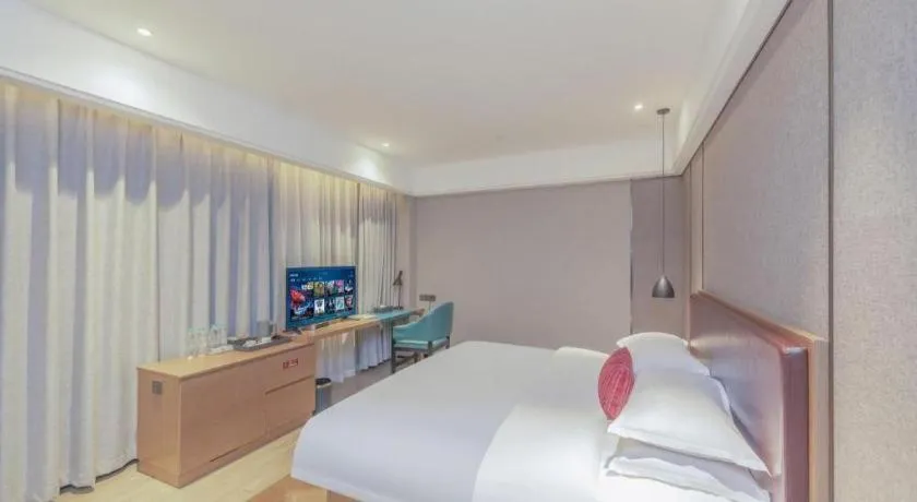 Bed in Borrman Hotel Liuzhou Guizhong Avenue Liugao