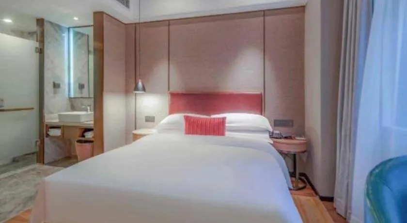 Bed in Borrman Hotel Liuzhou Guizhong Avenue Liugao