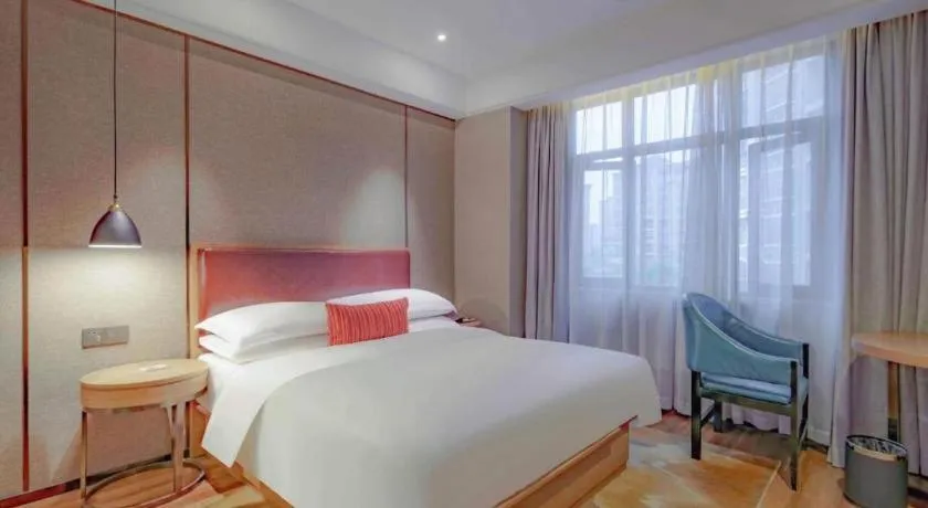 Bed in Borrman Hotel Liuzhou Guizhong Avenue Liugao