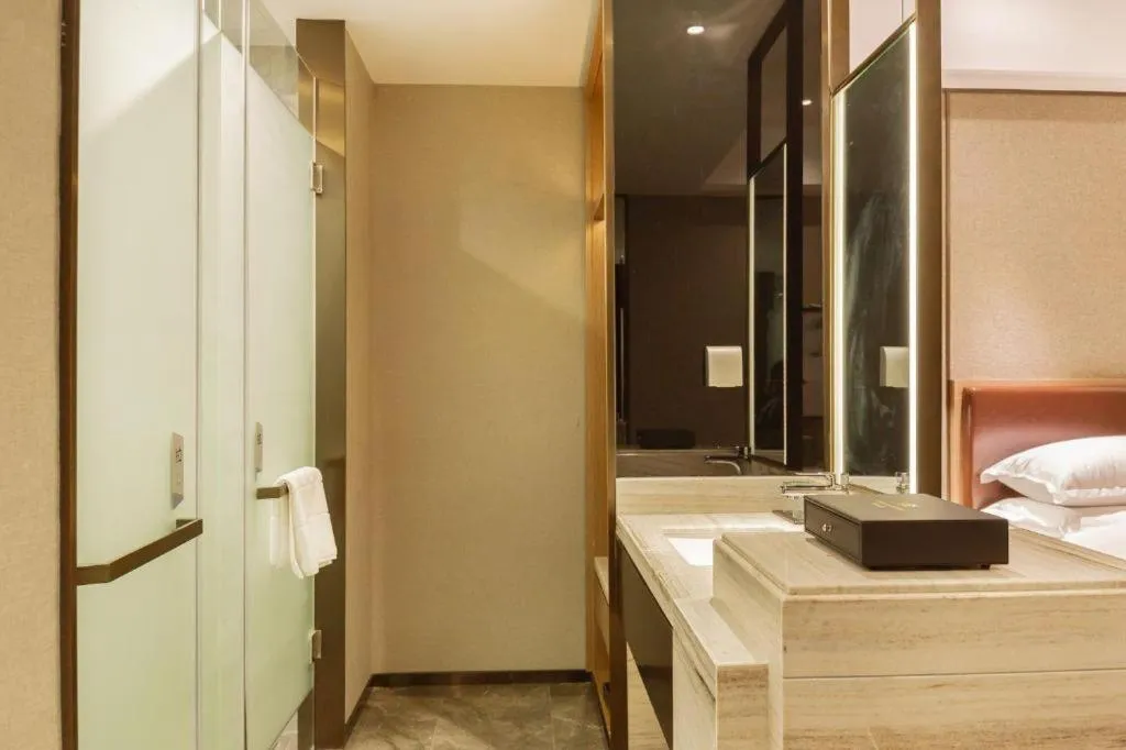 Bed in Borrman Hotel Liuzhou Guizhong Avenue Liugao