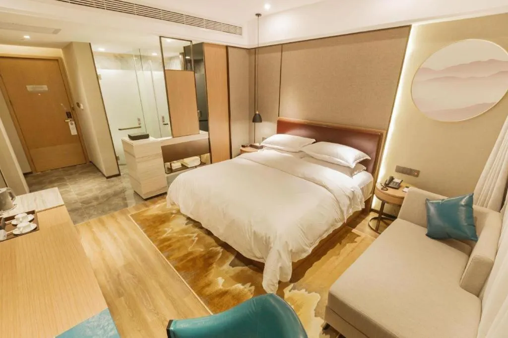 Bed in Borrman Hotel Liuzhou Guizhong Avenue Liugao