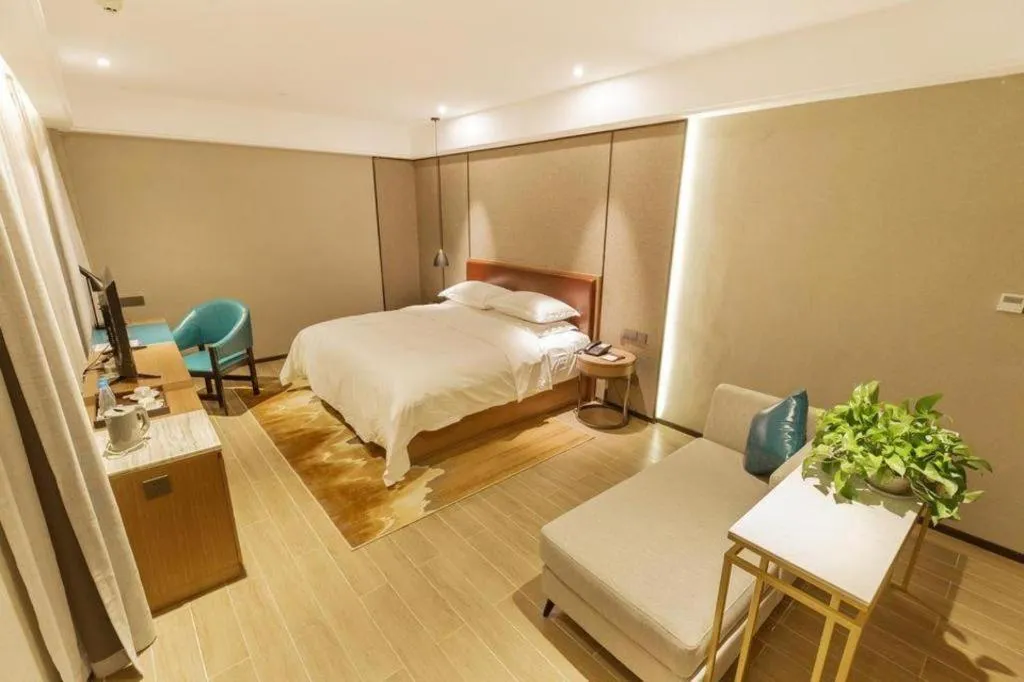 Bed in Borrman Hotel Liuzhou Guizhong Avenue Liugao