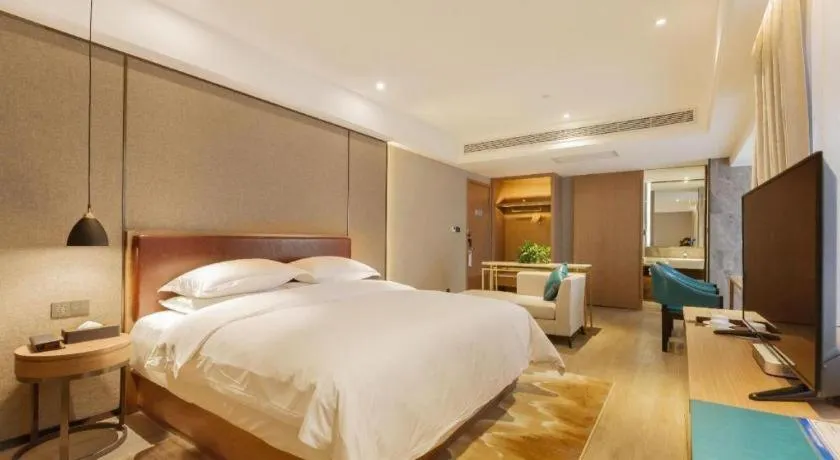 Bed in Borrman Hotel Liuzhou Guizhong Avenue Liugao