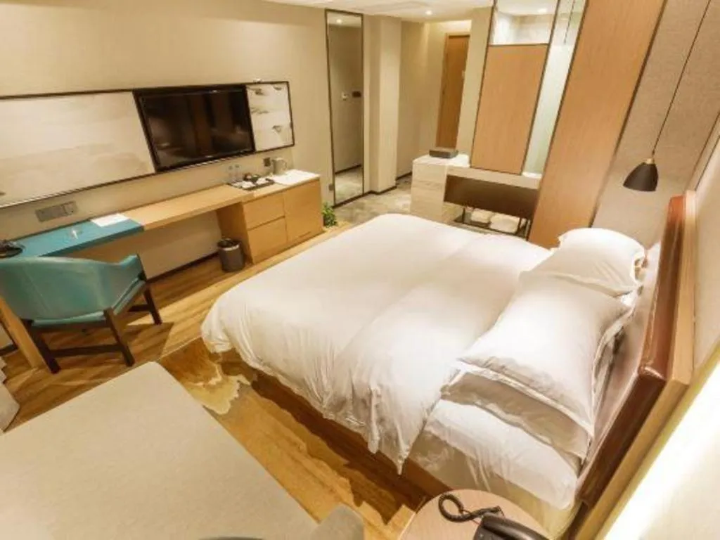 Bed in Borrman Hotel Liuzhou Guizhong Avenue Liugao