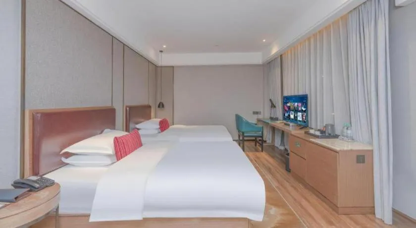 Bed in Borrman Hotel Liuzhou Guizhong Avenue Liugao