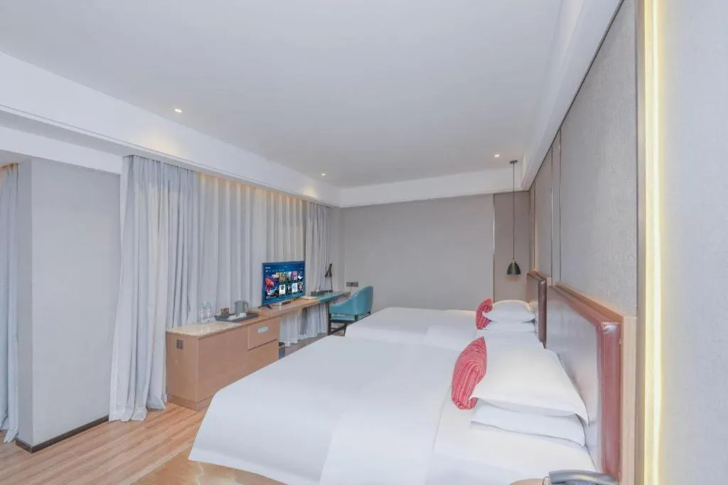 Bed in Borrman Hotel Liuzhou Guizhong Avenue Liugao