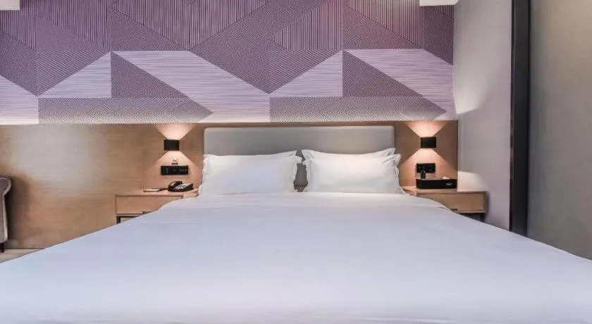 Bed in Borrman Hotel Liuzhou Guizhong Avenue Liugao