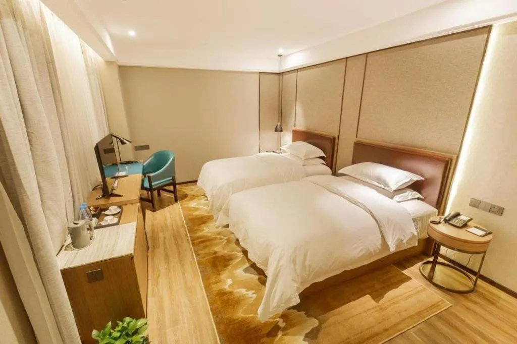 Bed in Borrman Hotel Liuzhou Guizhong Avenue Liugao