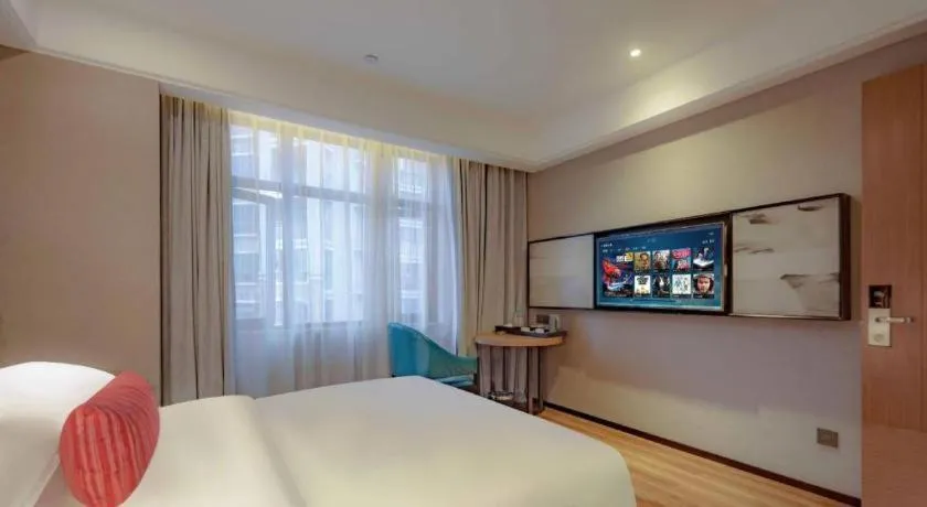 Bed in Borrman Hotel Liuzhou Guizhong Avenue Liugao