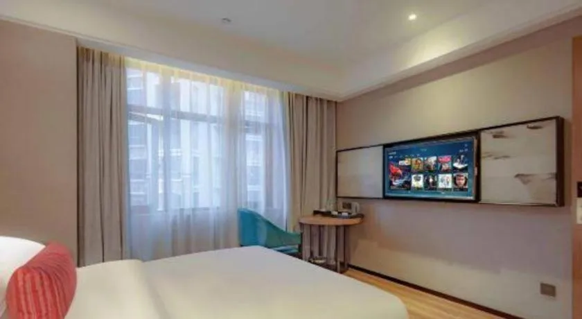 Bed in Borrman Hotel Liuzhou Guizhong Avenue Liugao