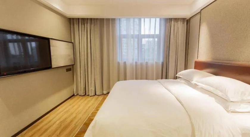 Bed in Borrman Hotel Liuzhou Guizhong Avenue Liugao