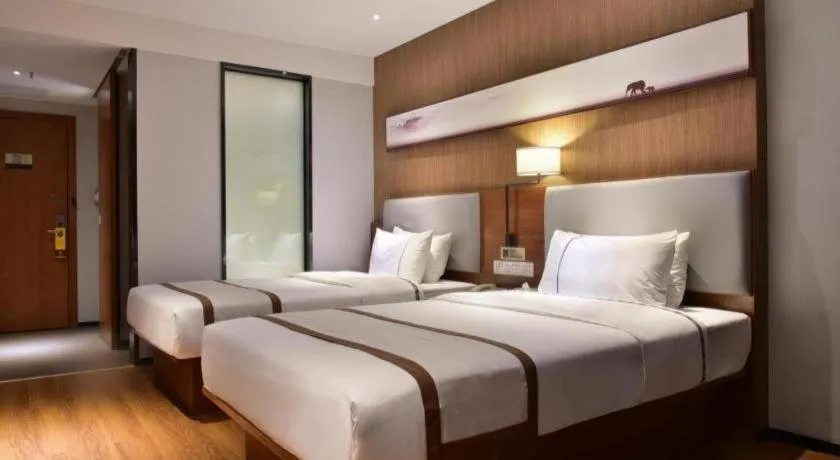 Bed in Jtour Inn Xianning Chongyang Taoxi Avenue