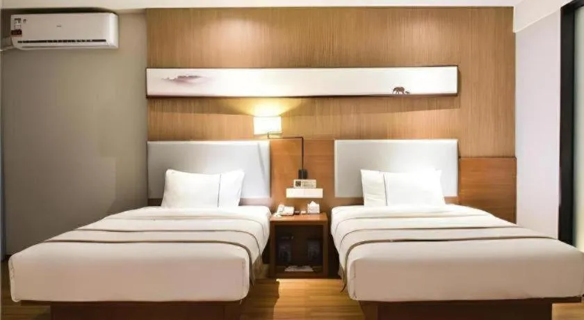 Bed in Jtour Inn Xianning Chongyang Taoxi Avenue