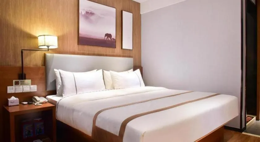 Bed in Jtour Inn Xianning Chongyang Taoxi Avenue
