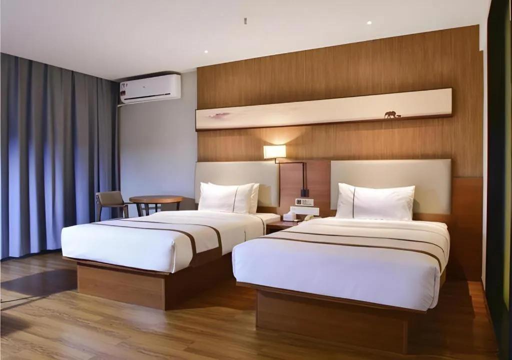 Bed in Jtour Inn Xianning Chongyang Taoxi Avenue