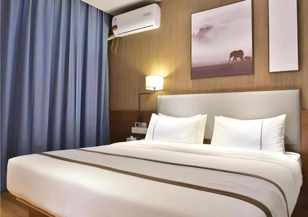 Bed in Jtour Inn Xianning Chongyang Taoxi Avenue