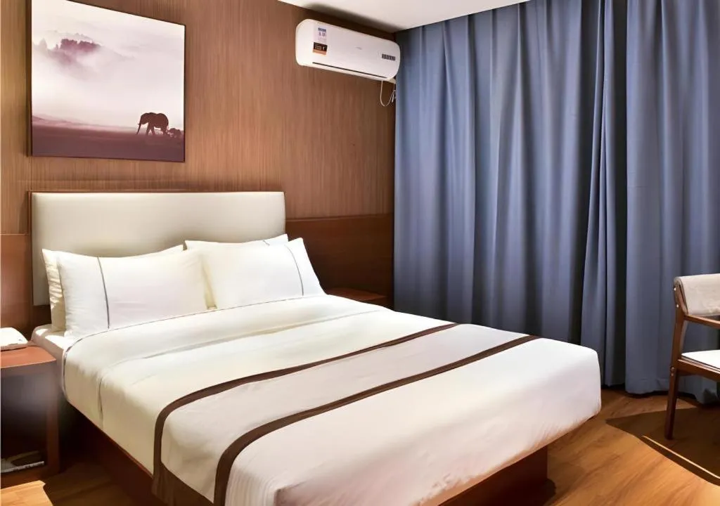 Bed in Jtour Inn Xianning Chongyang Taoxi Avenue