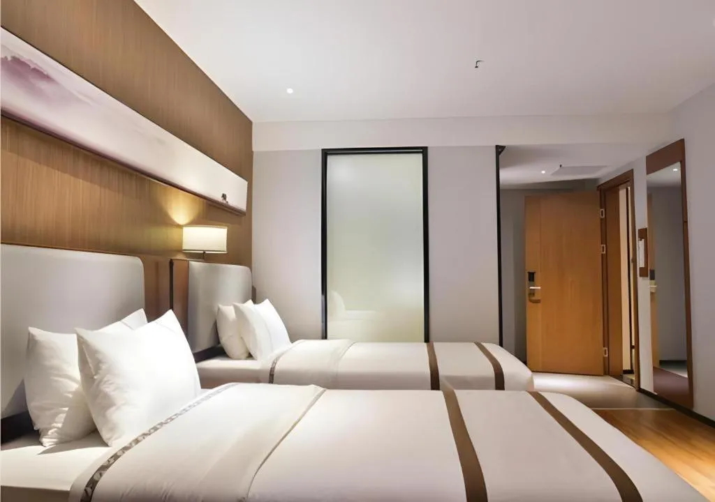 Bed in Jtour Inn Xianning Chongyang Taoxi Avenue