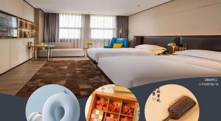 Bed in Echarm Plus Hotel Changsha High-speed Railway South Station Desiqin