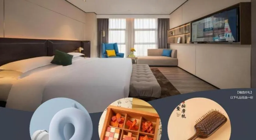 Bed in Echarm Plus Hotel Changsha High-speed Railway South Station Desiqin