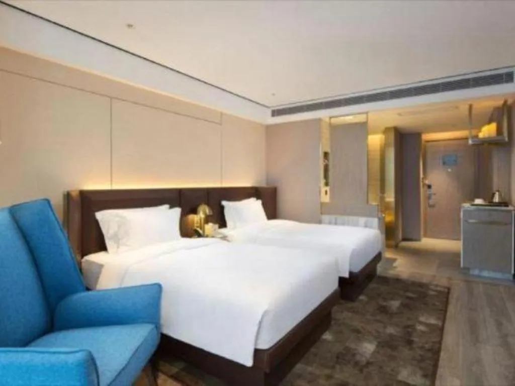 Bed in Echarm Plus Hotel Changsha High-speed Railway South Station Desiqin