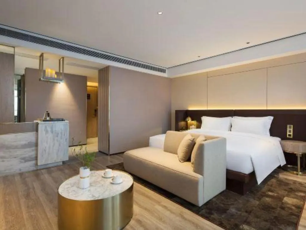 Bed in Echarm Plus Hotel Changsha High-speed Railway South Station Desiqin