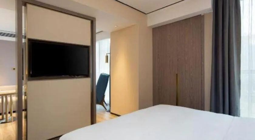 Bed in Echarm Plus Hotel Changsha High-speed Railway South Station Desiqin